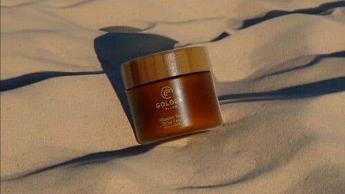 Golden Tallow jar photographed in a natural setting to support product marketing visuals