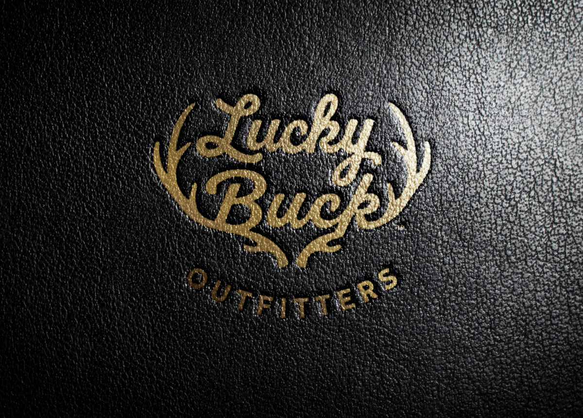 Lucky Buck Outfitters logo stamped into leather